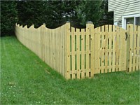 <b>Spaced Picket Fence with a Concave Dip and an Arched Gate</b>